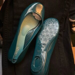 Never worn out of box with original bag